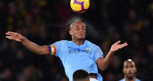 Manchester City’s Vincent Kompany in action at Vicarage Road last night. Photograph: Getty Images