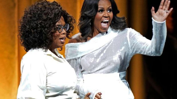 Michelle Obama and Oprah Winfrey atthe in Chicago. Photograph: Jim Young/AFP/Getty Images