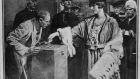  December 18th 1918: Women queuing up to cast their votes for the first time. Photograph: Hulton Archive/Getty Images