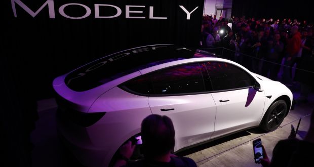 New Tesla Model Y Unveiled With Longer Roll Out Timetable