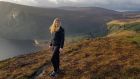 Rachel Flaherty hiking along Lough Tay in the Wicklow Mountains in Co Wicklow.