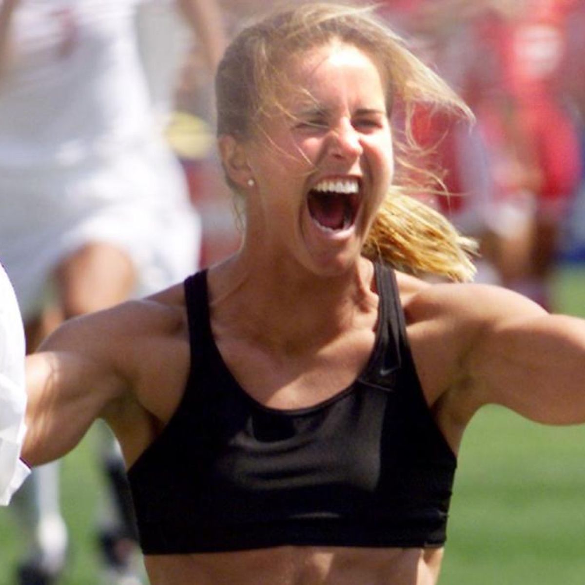 male soccer player sports bra