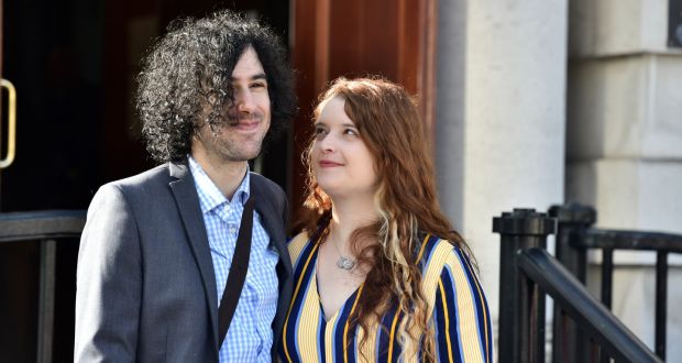  Emma DeSouza and her husband Jake at Belfast High Court on Tuesday. Ms DeSouza applied for a residence card for her US-born husband Jake using her Irish passport in December 2015 which the British Home Office rejected, saying she was British.   Photograph: Colm Lenaghan/Pacemaker 