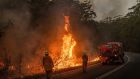 Fire crews burn off brush near Jerrawangala, Australia.  Photograph: Matthew Abbott/The New York Times