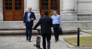 Tánaiste Simon Coveney, Minister for Finance Paschal Donohoe and Green Party leader Eamon Ryan meet for talks on Government formation at Government Buildings. Photograph: Alan Betson / The Irish Times.