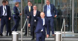  Fianna Fáil leader Micheál Martin emergingfrom the Convention Centre after being elected as Taoiseach. Photograph: Alan Betson / The Irish Times