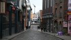 David McWilliams: ‘The Craic Economy covers bars, restaurants, hotels, comedy clubs ... and so one.’ All quiet in Temple Bar, Dublin on the eve of St Patricks Day this year as coronavirus restrictions came into place. Photograph: Nick Bradshaw/The Irish Times