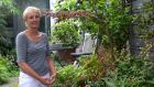 Valerie Duffy in her city garden in Rathmines. Photograph:  Damien Eagers 