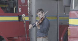 Fiddle player Liam O’Connor on site in the Fire Brigade Training Centre in the Coombe