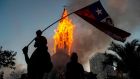  Demonstrations  on the  first anniversary of the social uprising in Chile, in Santiago,  as the country prepares for a landmark referendum. Photograph:  Martin Bernetti/ AFP via Getty