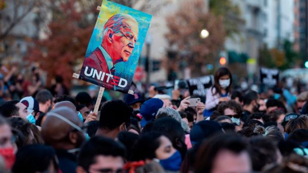 Black Lives Matter Plaza: Celebratory scenes were replicated across US cities. Photograph: Andrew Caballero-Reynolds