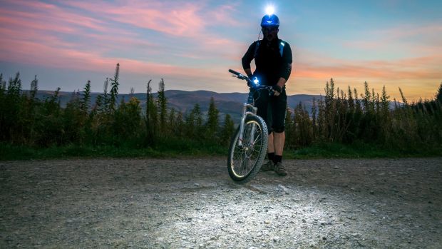 Mountain biking after dark has the potential to be more dangerous but the risks can be reduced by riding familiar trails, using a good set of lights, wearing protective biking glasses and (of course) slowing down. Photograph: iStock