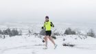 Joggers in Rossmore, Co Carlow after large parts of the country were covered in snow. Photograph: Niall Carson/PA Wire