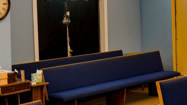 The pews where Moses Jones, who died of the coronavirus in April 2020, used to sit at Mount Olive Missionary Baptist Church, in Chicago. Photograph: Lyndon French/New York Times