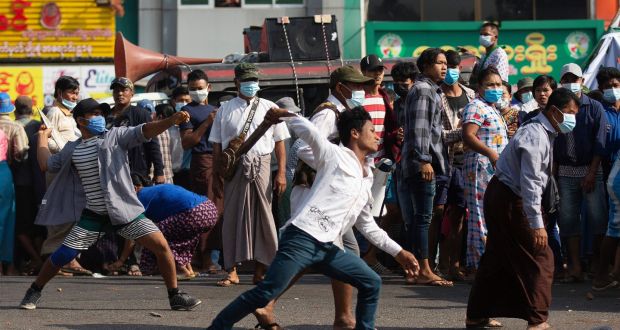 Supporters Of Myanmar Military Attack Coup Protesters In Yangon