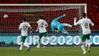 Republic of Ireland goalkeeper Mark Travers dives in vain as Serbia’s Aleksandar Mitrovic (not pictured) scores their second goal during the  World Cup qualifier in Belgrade. Photograph:  Novak Djurovic/PA Wire