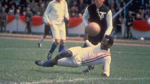 Pelé scores the equalising goal for the Allied POW’s during the match against Germany in Paris featured in the filming of Escape to Victory. Photograph: Allsport UK /Allsport