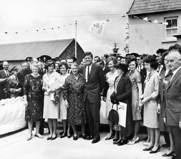 President Kennedy with relatives on a visit to Dunganstown, Co Wexford, site of the Kennedy ancestral home. Standing beside him is his sister Jean Smith; his second cousin Mary Ryan; and her daughters Josephine and Mary Ann. Photograph: Bettmann/Getty