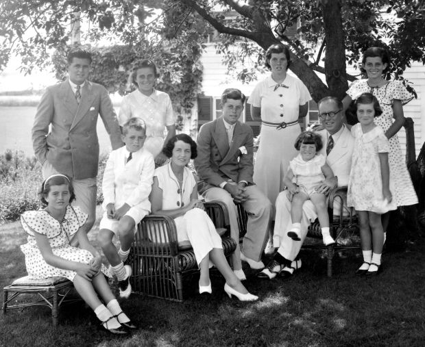The Kennedys at Hyannis Port in the 1930s: (seated from left) Patricia Kennedy, Robert Kennedy, Rose Kennedy, John F Kennedy, Joseph P Kennedy snr with Edward Kennedy on his lap; (standing from left) Joseph P Kennedy jnr, Kathleen Kennedy, Rosemary Kennedy, Eunice Kennedy (rear, in polka dots) and Jean Kennedy. Photo by Bachrach/Getty