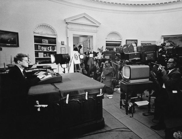 Cuban missile crisis: President Kennedy addresses the media in the Oval Office in October 1962. Photograph: Keystone/Getty