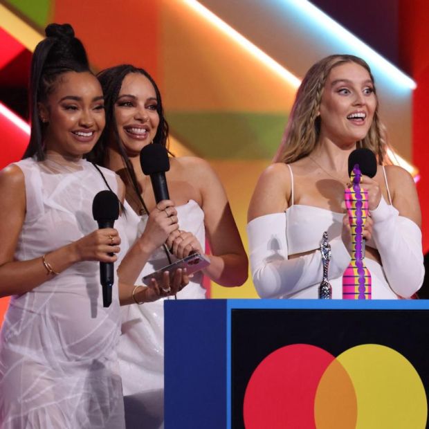 Leigh-Anne Pinnock, Jade Thirlwall and Perrie Edwards of Little Mix accept their British group award at the Brit Awards 2021. Photograph: John Marshall/AFP via Getty Images