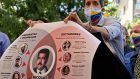 Opposition leader Juan Guaidó shows a poster depicting Venezuelan president Nicólas Maduro’s alleged links with criminals during a press conference in Caracas on May 12th. Photograph: Getty Images