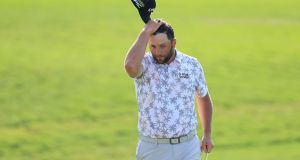 Runaway leader Jon Rahm withdraws from Memorial after ...
