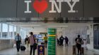 JFK airport in New York: Thousands who live and work legally in the US under non-immigrant visas are unable to leave the country as they are not sure if they will be readmitted. Photograph: Angela Weiss/AFP