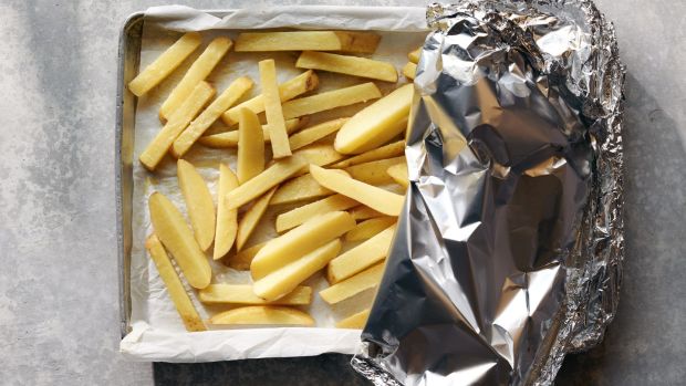 Covering the potatoes with foil allows them to steam a bit in the oven before they are uncovered to crisp up.