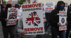 Loyalists take part in an anti-Northern Ireland Protocol rally in Portadown, Co Armagh.