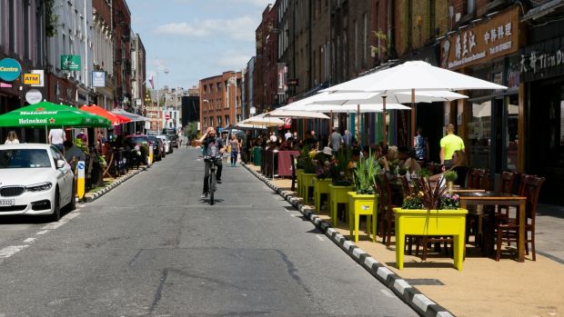 Restaurant tables on Capel Street in Dublin on Friday. The Taoiseach on Friday said indoor dining is set to resume from July 26th, despite the surge in Covid cases. Photograph: Collins