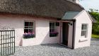 Killee Cottage in Mitchelstown is an adorable thatched cottage for two.