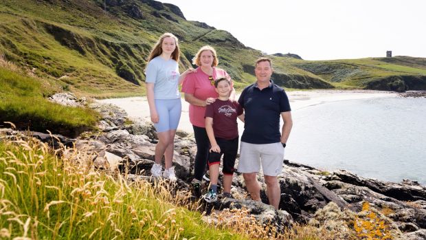 Crona Byrne with her husband, Phil Carney, and their children, Kate and Harry, in Co Donegal. Photograph: Joe Dunne