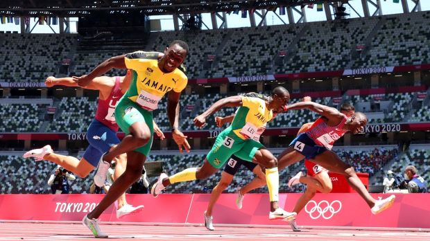 Hansle Parchment finishes first ahead of Grant Holloway and Ronald Levy to win the gold medal in the menâ€™s 110m hurdles final at the Olympic Stadium. Photograph: Matthias Hangst/Getty Images