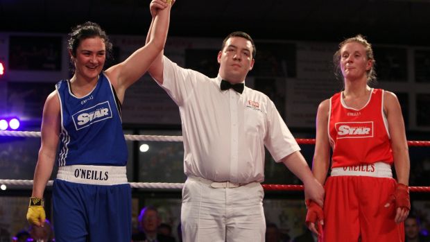 Kellie Harrington (blue) has her hand raised after beatying Jessica Lyons in the Irish elite championships in 2010. Photo: Dan Sheridan/Inpho