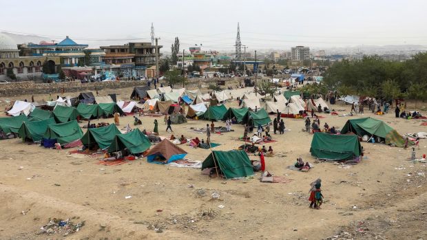 Internally displaced families from northern provinces, who fled from their homes, take shelter in a public park in Kabul. Photograph: Hedayatullah Amid/EPA