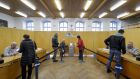 Swiss citizens casting their ballots in a referendum: direct democracy ensures that everyone participates and reduces enormously the potential for the accusation that the government is not relevant or remote. Photograph: Getty Images