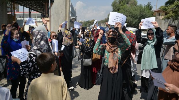 Afghan women take part in a protest march for their rights under the Taliban rule in the downtown area of Kabul. Photograph: Hoshang Hashimi/AFP via Getty