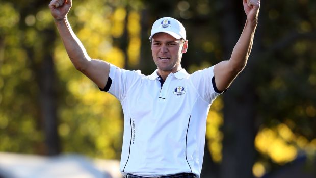 Martin Kaymer celebrates after making the putt that retained the Ryder Cup for Europe on the 18th green in his match against Steve Stricker at Medinah Country Club in 2012. Photograph: Ross Kinnaird/Getty Images