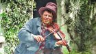 Fiddler c.1860-1883. Photograph: National Library of Ireland. From Old Ireland in Colour 2