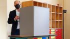 Olaf Scholz about to cast his ballot at a polling station  during general elections in Germany last weekend. Photograph: Wolfgang Rattay/Pool/AFP via Getty Images