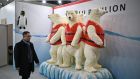 A delegate passes a display of polar bears wearing life jackets on the Tuvalu trade stand on the sidelines of the Cop26 UN Climate Change Conference in Glasgow on Monday. Photograph: Oli Scarff/AFP via Getty Images)