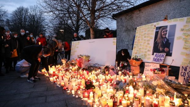 People light candles after a vigil in memory of Ashling Murphy in Tullamore Town Park, Co Offaly. Photograph: Damien Eagers/PA Wire
