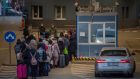 People wait in line as they arrive to the border between Ukraine and Slovakia: ‘We were living a normal life up until just a few days ago.’ Photograph: Martin Divisek/EPA
