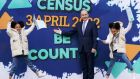 Taoiseach Micheál Martin and Mya and Zara Akinsowon, both aged 8 from Baldoyle, Co Dublin, at Government Buildings where details of the Census on April 3rd were revealed. Photograph: Brian Lawless/PA Wire
