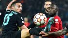 Naby Keita  of Liverpool in action against Danilo D’Ambrosio of Inter Milan during the  Champions League round of 16, second leg match at Anfield. Photograph:  Peter Powell/EPA