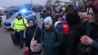 People from Ukraine wait to board buses that will take them to nearby Przemysl shortly after their arrival in Poland at the Medyka border crossing on March 4th. Photograph: Sean Gallup/Getty 