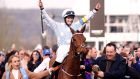 Jockey Rachael Blackmore celebrates after winning the Unibet Champion Hurdle Challenge Trophy on Honeysuckle on day one of the  Cheltenham Festival. Photograph:   David Davies/PA 