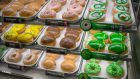 Doughnuts inspired by St Patrick’s Day on sale at Krispy Kreme in Times Square, New York in March 2021. Photograph: Alexi Rosenfeld/Getty Images