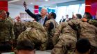US president Joe Biden takes a selfie with members of the 82nd Airborne Division  in Jasionka, near Rzeszów: ‘The world ain’t going to be the same.’ Photograph: Doug Mills/New York Times